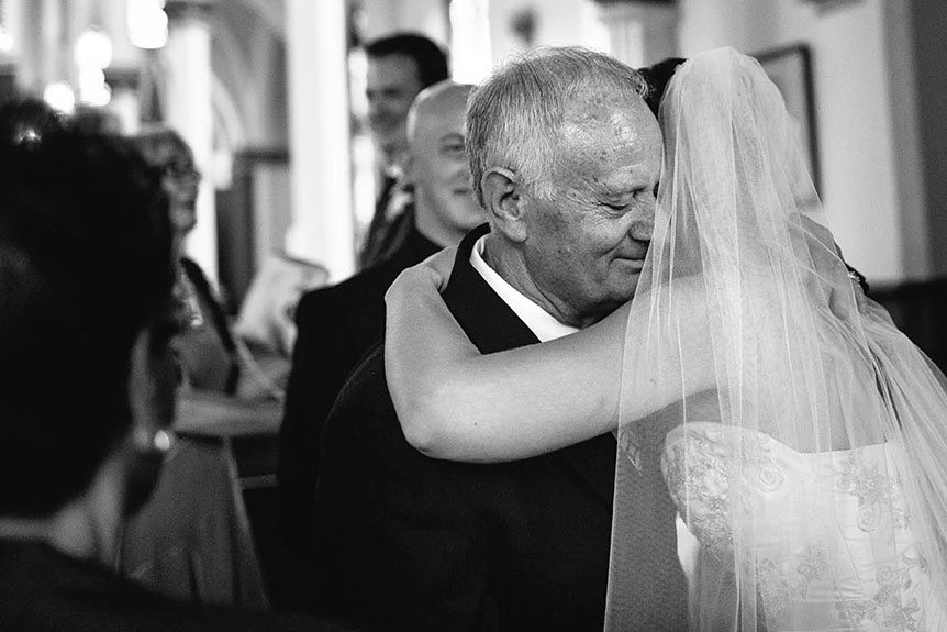 The Father of the bride is embraced by the bride at a wedding in Ingersoll.
