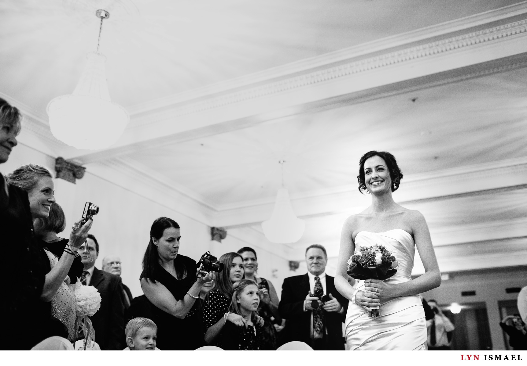 Bride walks down the aisle at a Walper Hotel wedding.