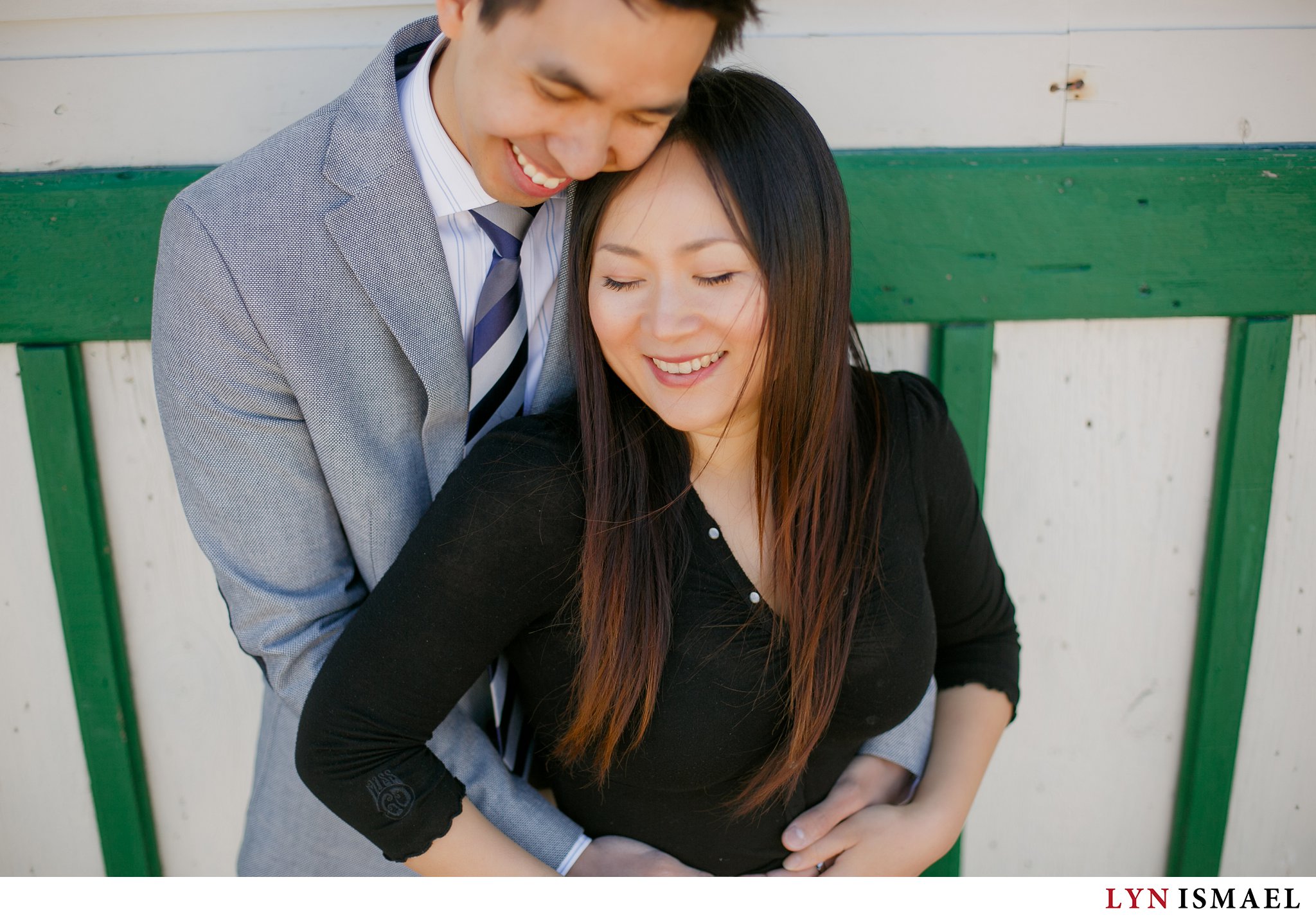 An Asian couple poses for their engagement session at Puddicombe Farms