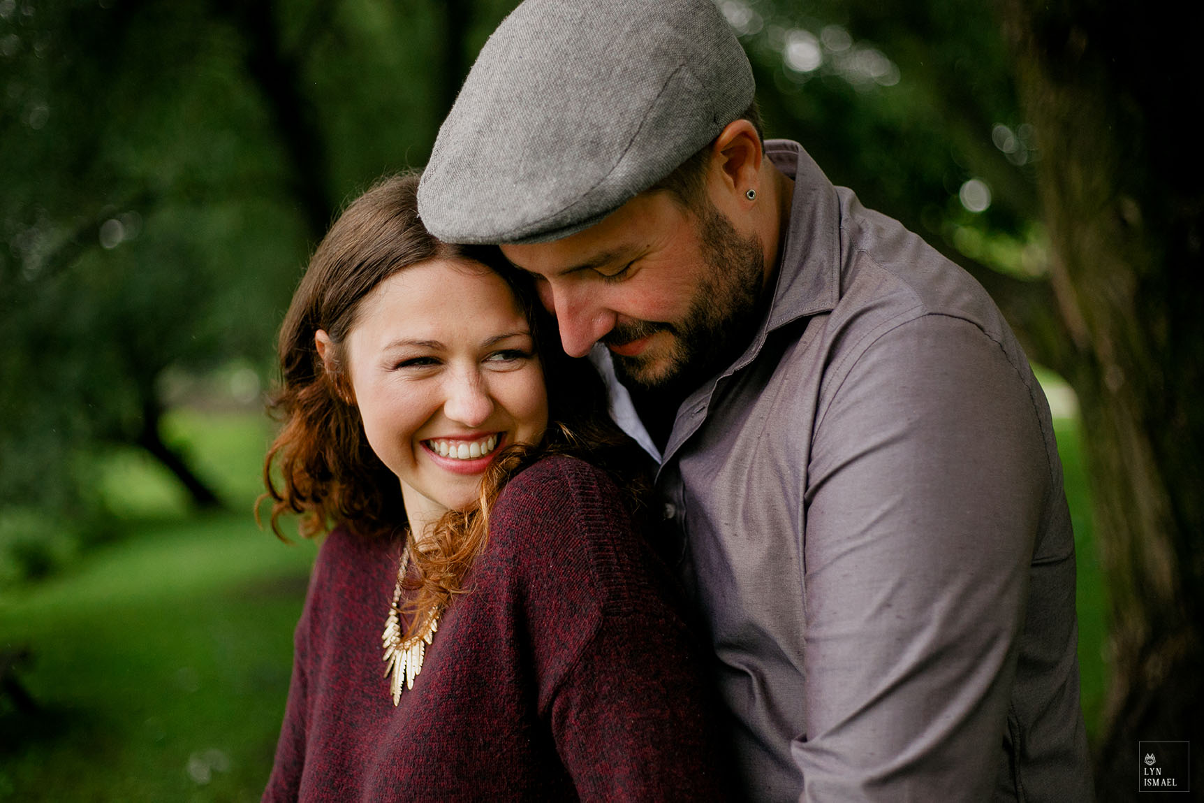 An engaged couple poses for their engagement session in Stratford, Ontario.