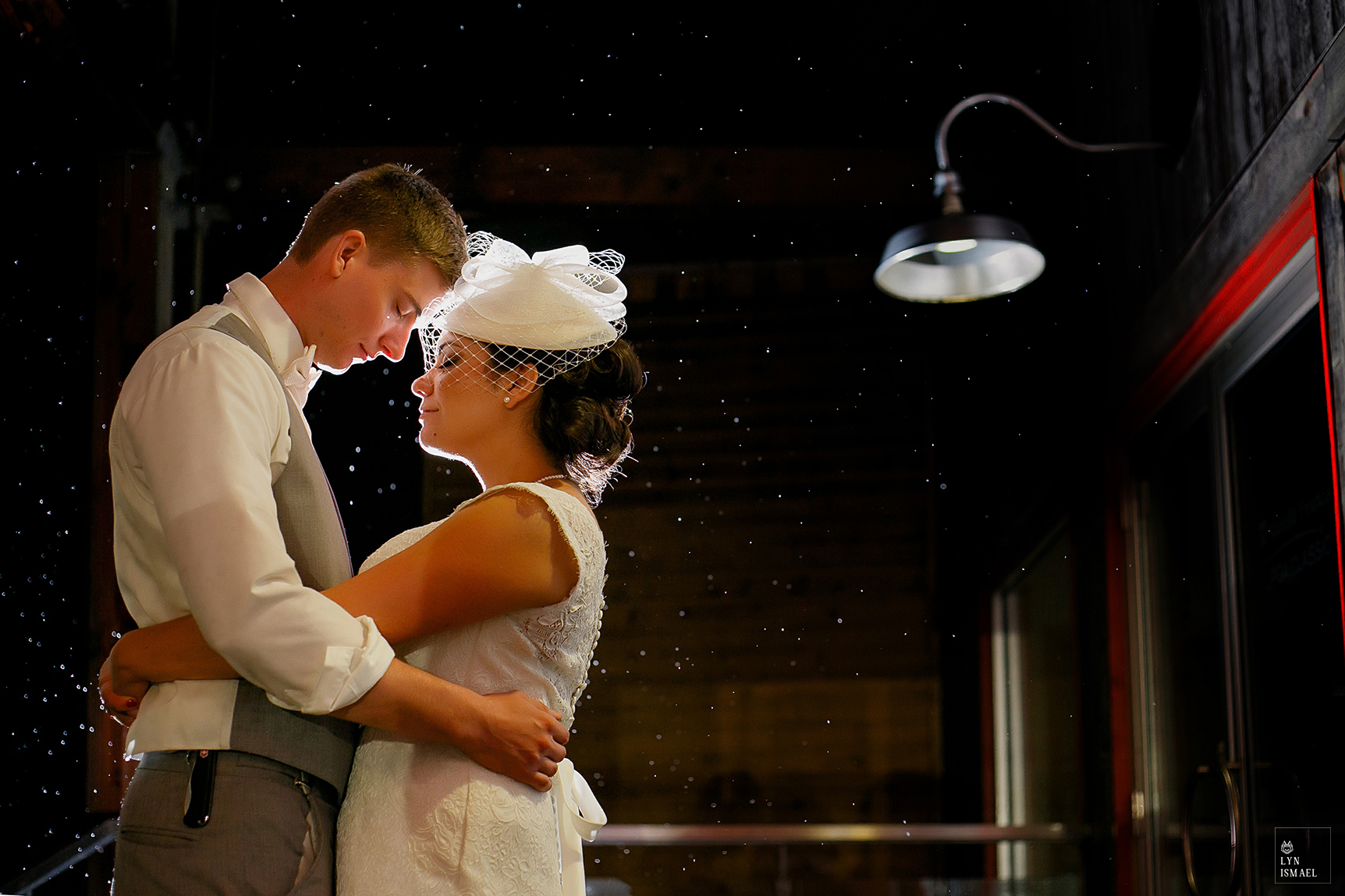 Night portrait in the rain with a bride and groom at Grey Silo in Waterloo, Ontario.